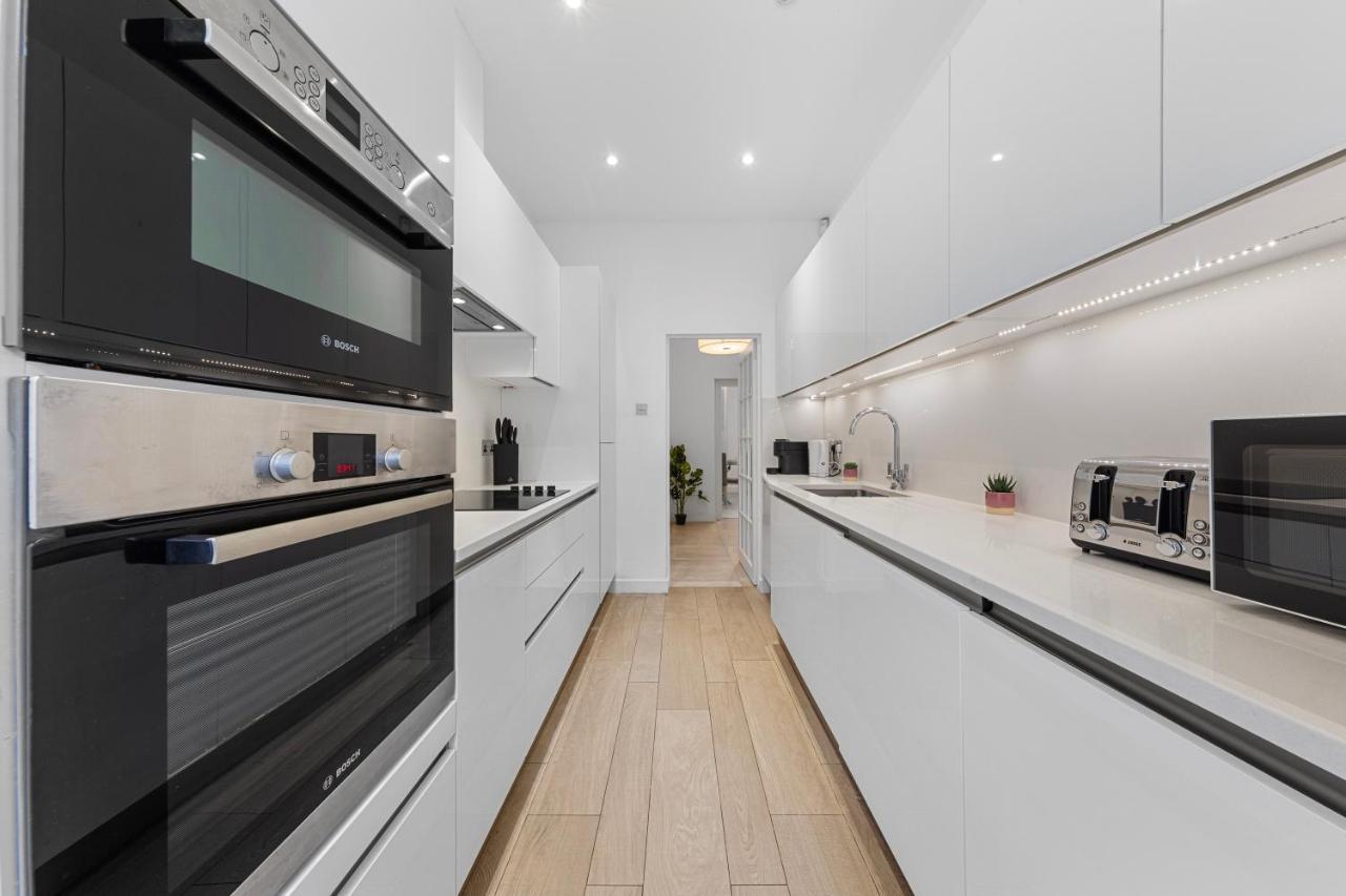 Appartamento Harrods 2 Bed Lux Flat W/Patio Londra Esterno foto